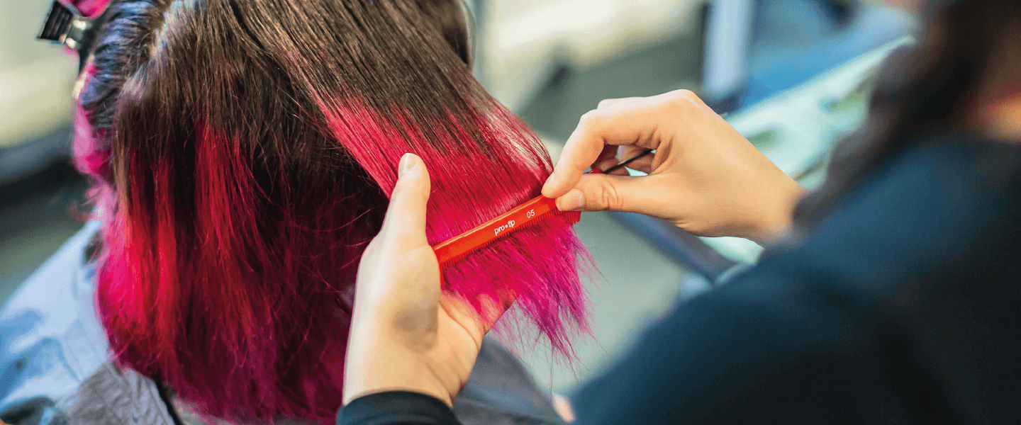 Student cutting hair