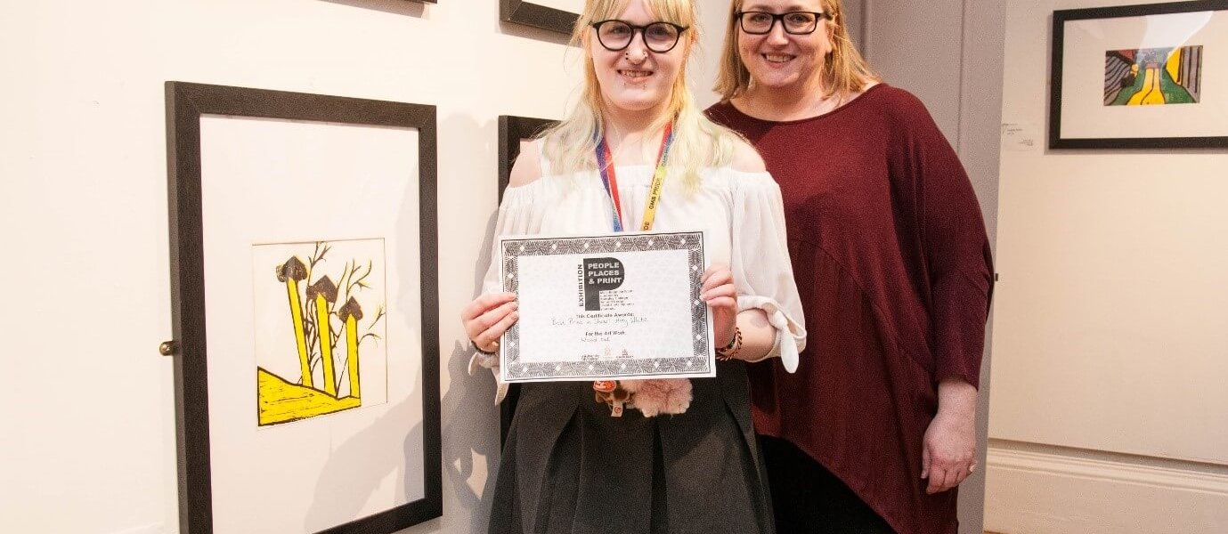 Barnsley College Art and Design student Amy White and Vice Principal Liz Leek at the People, Places and Print exhibition at the Cooper Gallery