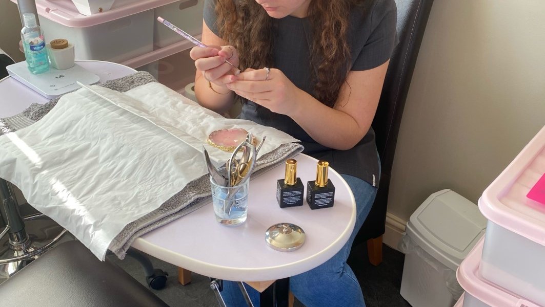 Former Barnsley College student Kyra Taylor practicing her nail art skills