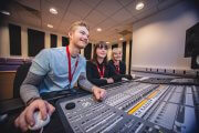 students using mixing desk