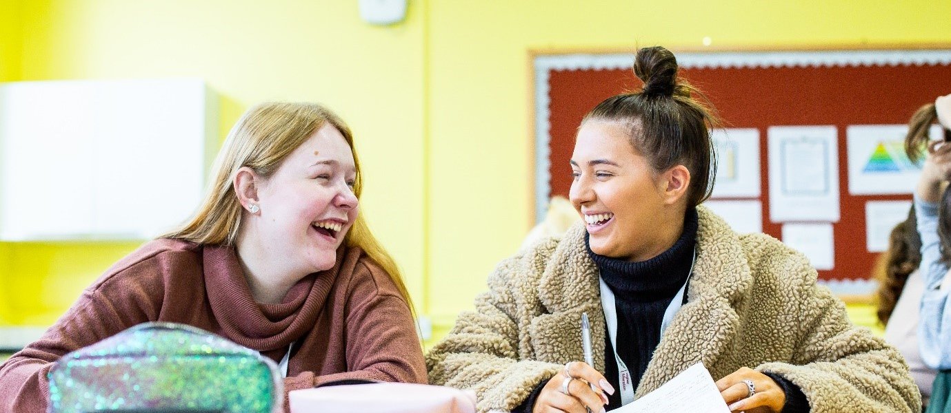 Health and Social Care Higher Education students studying together.