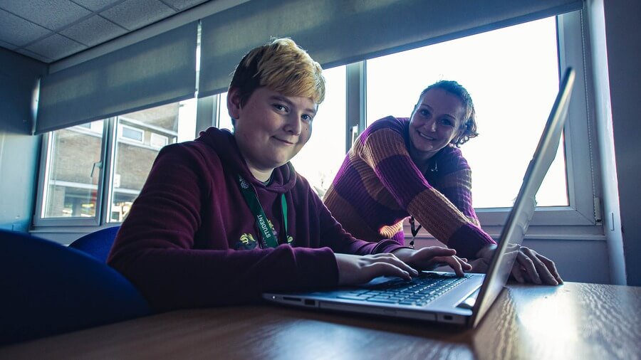 A Barnsley College Foundation Learning student with a tutor.