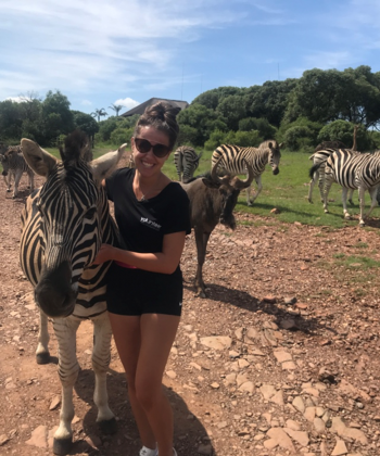 Hannah Smith with a zebra.