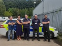 Barnsley College's automotive teaching staff with members of South Yorkshire Police's Vehicle Fleet Department