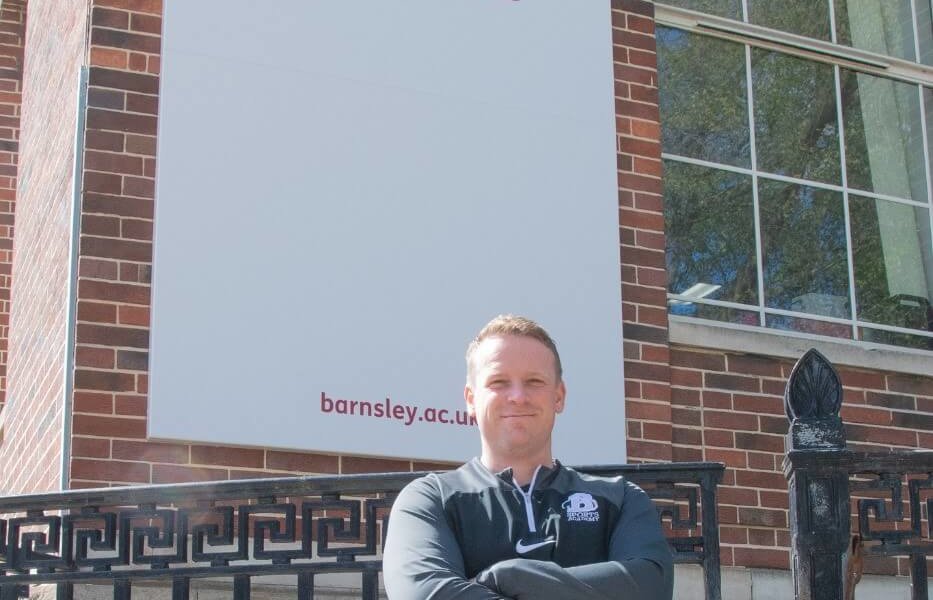 Lliam Dickinson stood in front of Barnsley College University Centre.