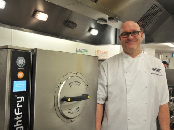 Barnsley College Head of Catering Martyn Hollingsworth with his new air fryers.