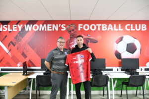 Barnsley Women's FC Chairman, Steve Maddock, presenting the shirt at Barnsley College Sports Academy.
