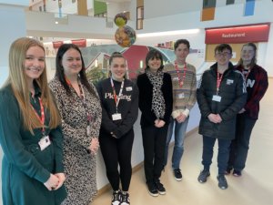 Baroness Parminter with Barnsley College Sustainability Officer Sasha Beswick and students.