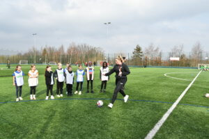 Primary school girls taking part in the all-female football tournament