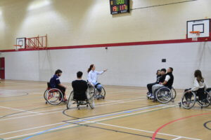 World European Champion and Paralympic wheelchair basketballer, Siobhan Fitzpatrick and Sports students during their workshop