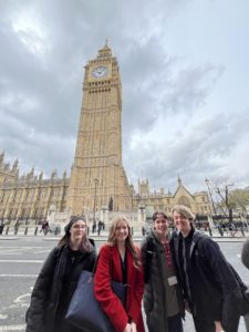 Four Barnsley College students stand in the foreground with Big Ben in the background.