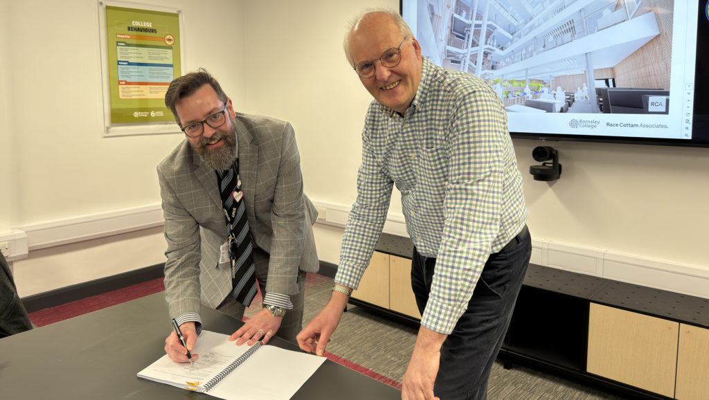 Barnsley College Principal and Chief Executive David Akeroyd, and Chair of Governors Simon Perryman, sign the IoT contract.