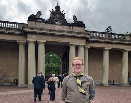 Esports student, Daniel Collier, inside Buckingham Palace gardens.